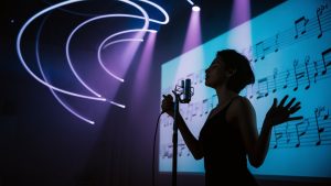 practice singing through karaoke